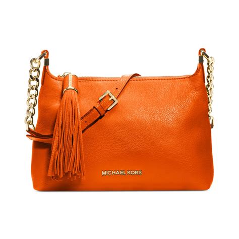 michael kors mini messenger bag orange|Michael Kors small Messenger bag.